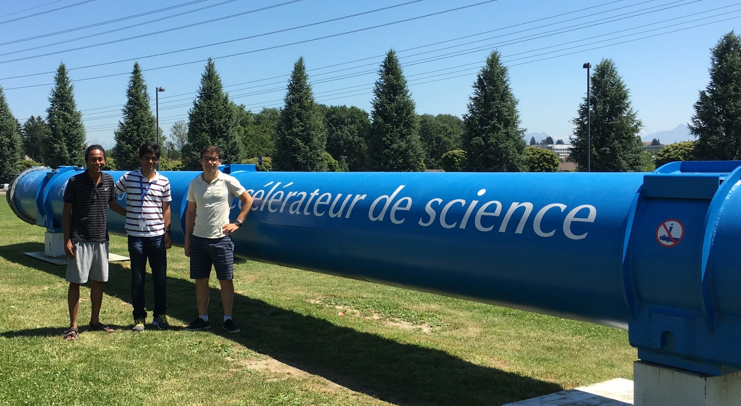  couple of the summer students I work with - Jayesh Mahapatra (India) and Federico Presutti (Italy), in front of a section of the LHC beam-pipe kept on display in front of the main cafeteria